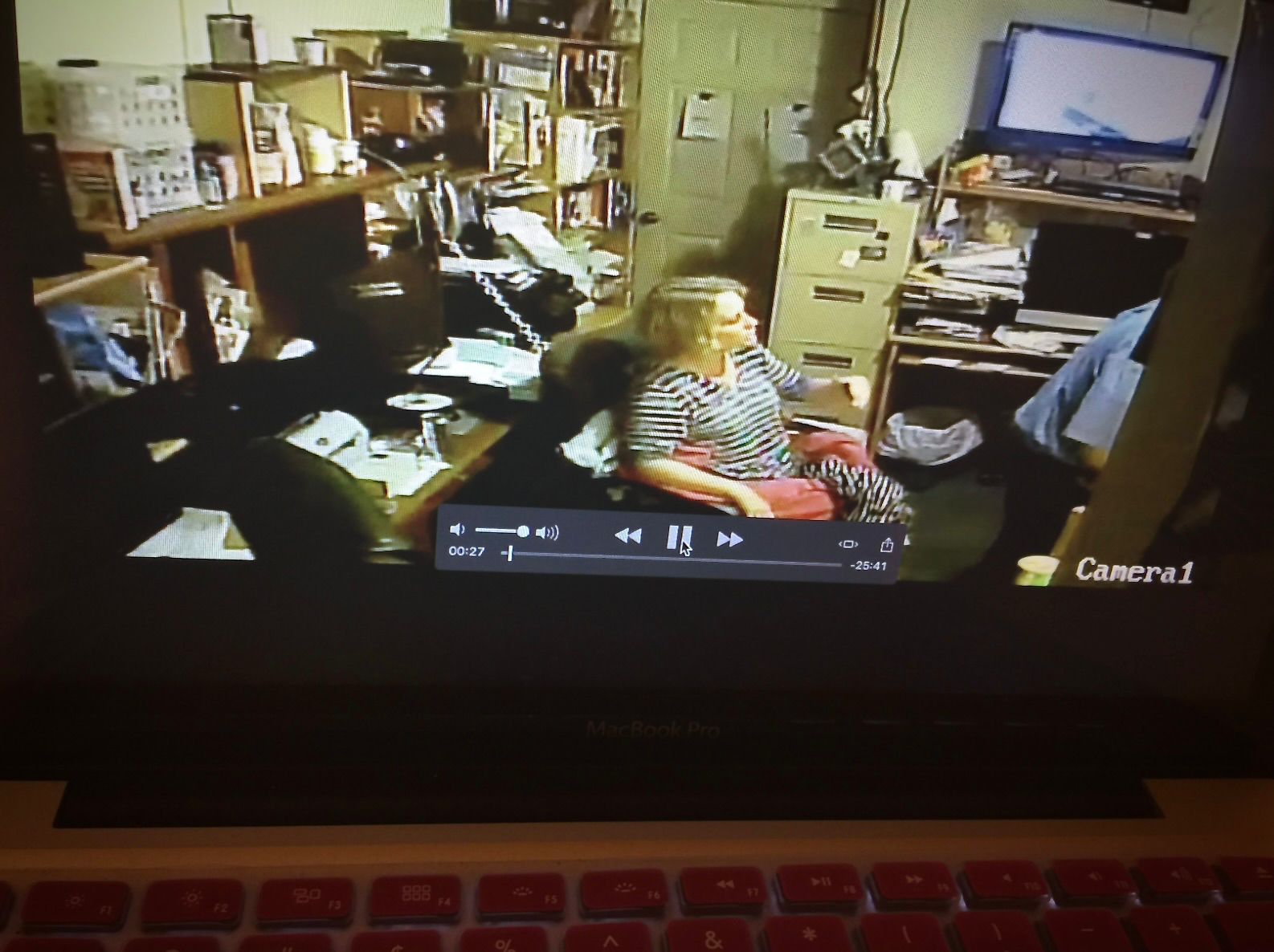 Eva viewed through office spy camera Eva viewed through office spy camera